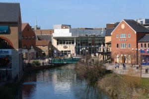 View along a canal to a shopping area